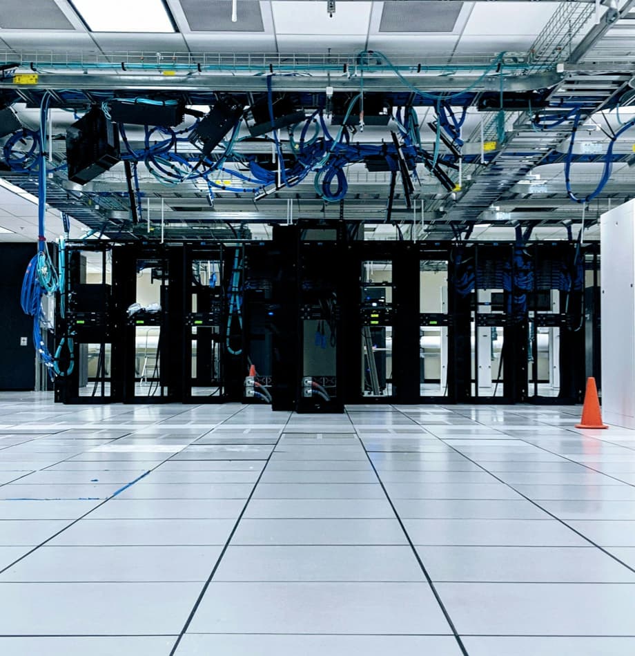 Perforated Raised Floor for Server Room Cooling installed in cold aisles or designated supply zones delivering underfloor air to equipment inlets